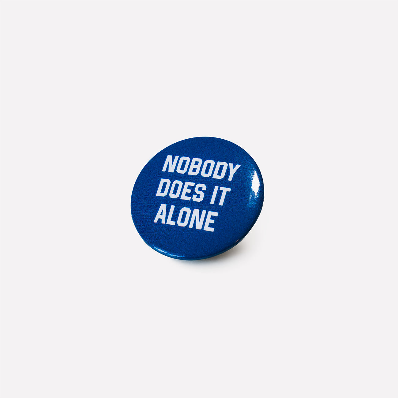 "NOBODY DOES IT ALONE" BUTTON PIN