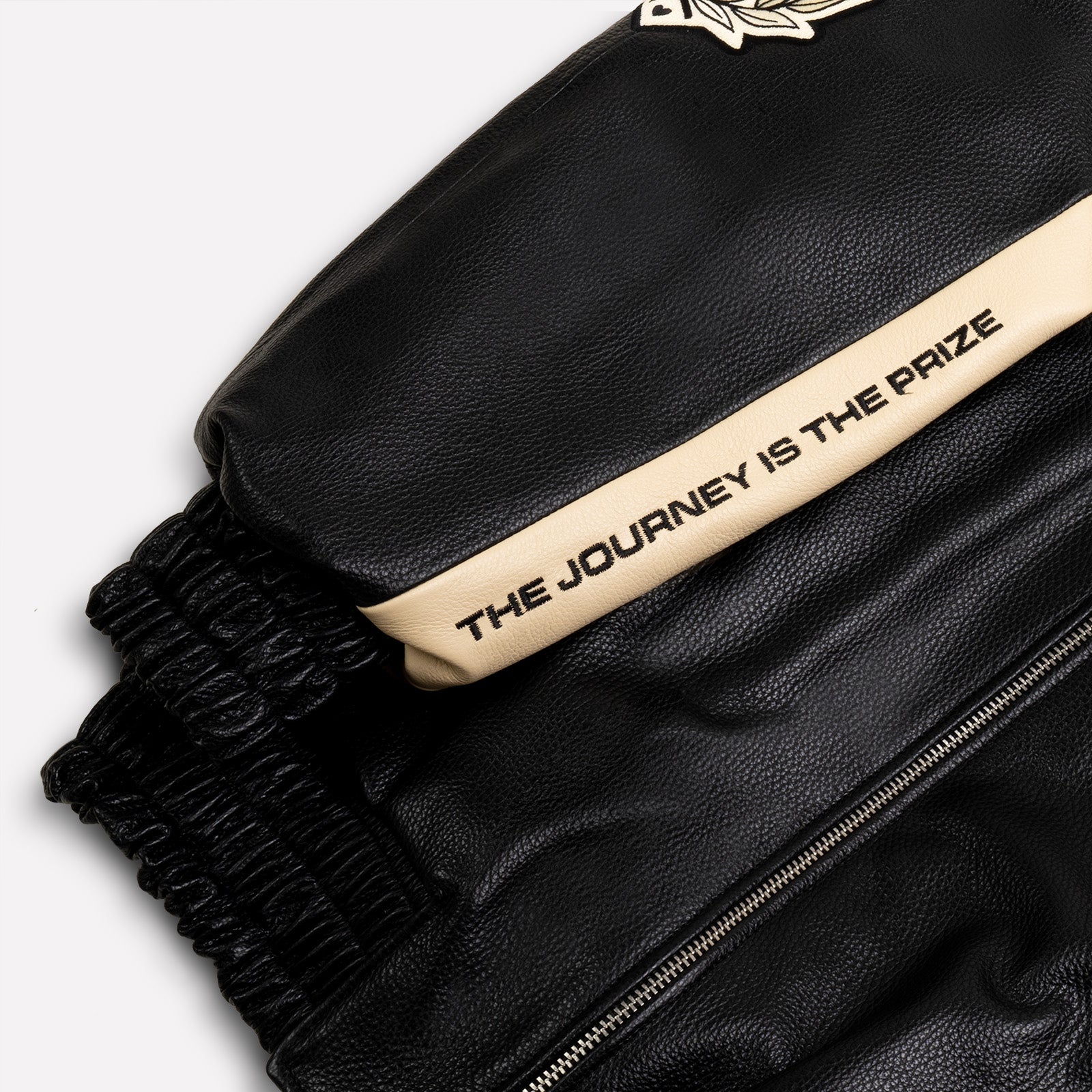 QUARTIER IS HOME X ROOTS - "THE JOURNEY IS THE PRIZE" LEATHER RACING JACKET (BLACK & ECRU)